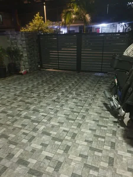 Exterior features: paved flooring with grey and white patterns, metal gate, outdoor lighting, surrounding greenery, plant pots, vehicle visible; style: modern.