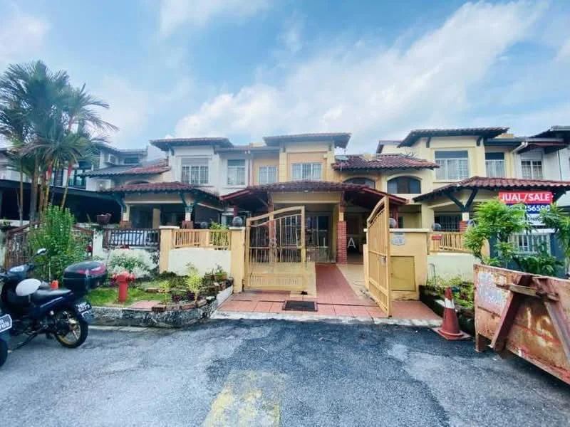 Exterior type: linked terrace house; features: two-storey building, yellow painted facade, red tiled roof, front garden with landscaping, paved walkway, gated entrance, porch area, decorative fencing, potted plants, motorcycle parked in front, garbage bin visible, surrounding greenery; style: modern.