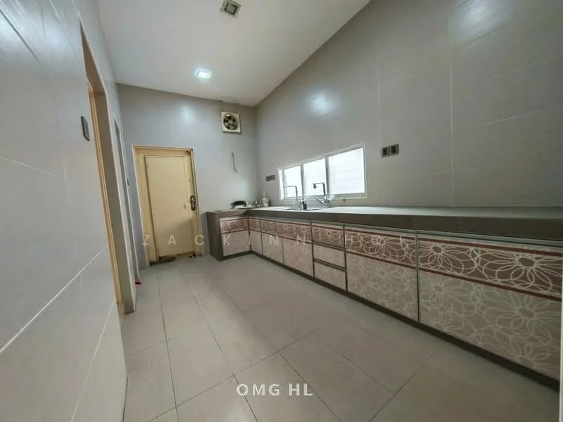Kitchen features: white tiled walls, grey tiled flooring, long kitchen countertop, built-in cabinetry with floral design, double-bowl stainless-steel sink, chrome pull-down faucet, window above sink, door leading to hallway, exhaust fan, recessed ceiling lights; style: modern.