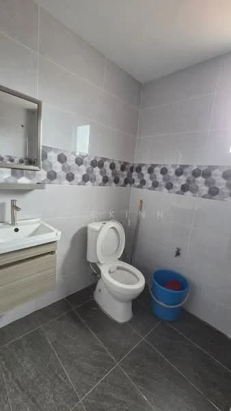 Bathroom features: grey ceramic tile flooring, white painted walls, hexagonal tile backsplash, single-sink vanity with wood cabinet, chrome basin mixer faucet, framed mirror, one-piece toilet, blue plastic bucket; style: modern.