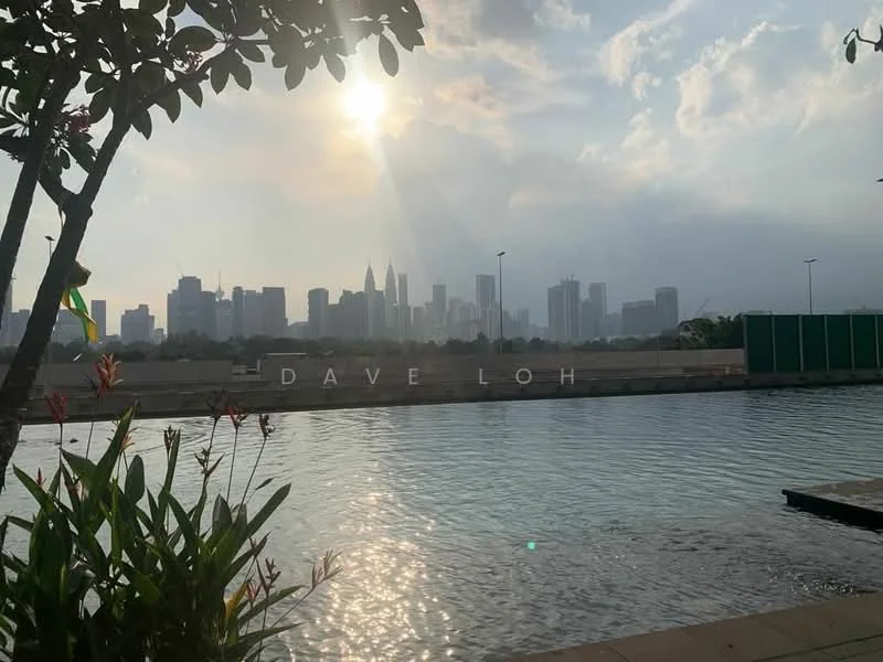 Exterior type: landscape garden; features: city skyline view, water feature, landscaped garden with plants, paved walkway, sunlight reflection on water, urban backdrop; style: modern.