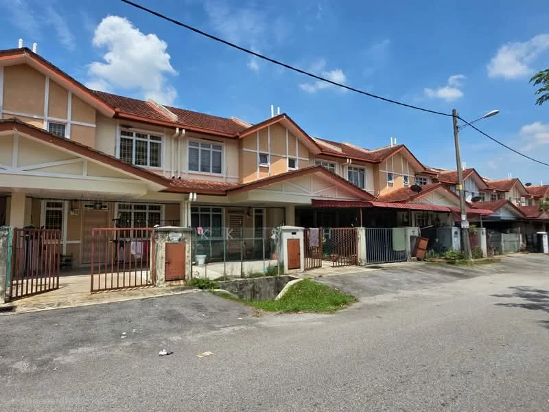 Exterior type: linked terrace house; features: two-storey linked terrace, red tiled roof, cream painted facade, front porch with gate, fenced yard, paved walkway, multiple windows, balconies on upper floor, street view, surrounded by greenery; style: modern.