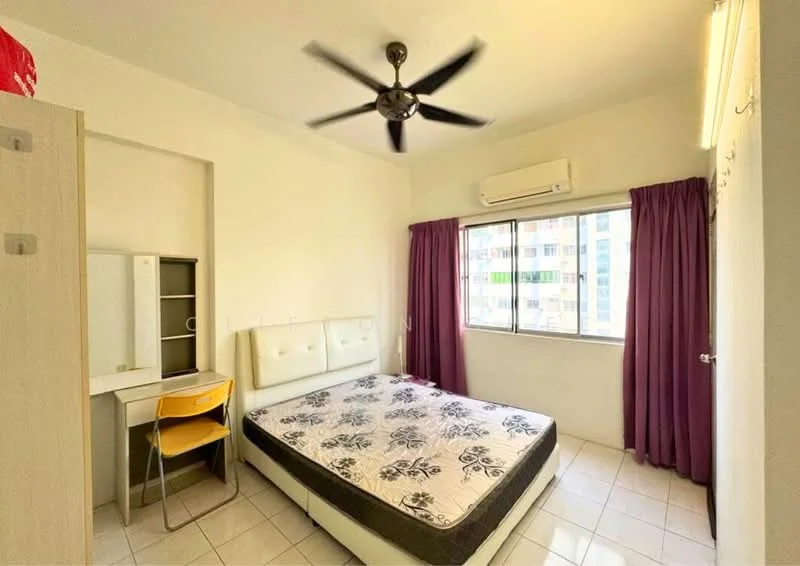 Bedroom features: queen-size bed, upholstered headboard, white bedding with floral pattern, study desk with chair, built-in wardrobe, floor-to-ceiling window, purple curtains, ceiling fan, wall-mounted air conditioning unit, white painted walls, tile flooring, decorative wall hooks; style: modern; view: city.