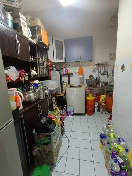 Kitchen features: white tiled flooring, dark wood cabinetry, stainless-steel fridge, built-in oven, double-bowl stainless-steel sink, chrome pull-down faucet, countertop with clutter, various kitchen appliances, multiple storage containers, wall-mounted shelves, light fixture on ceiling.
