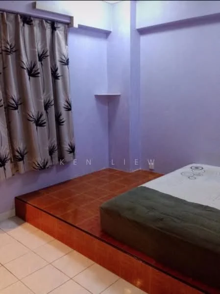 Bedroom features: purple painted walls, tiled flooring in cream, built-in shelf, curtains with leaf pattern, raised platform bed area, single bed with mattress, decorative wall, light source on ceiling.