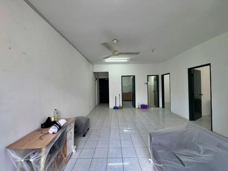 Room features: white painted walls, glossy white tile flooring, ceiling fan, two doorways leading to other rooms, large open space, unfurnished, no visible decor, natural light from windows; style: minimalist.