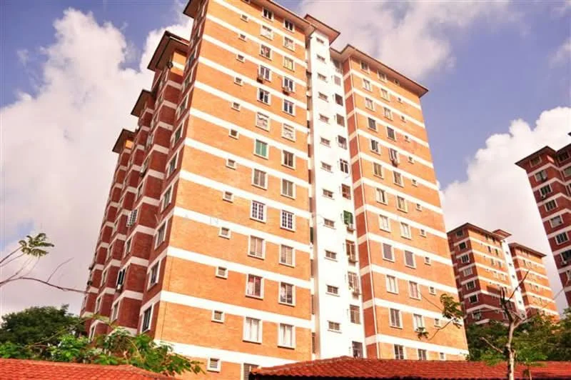 Exterior type: mid-rise condominium; features: red brick facade, white painted stripes, multiple windows, balconies, approximately 10-storey high-rise, surrounded by greenery; style: modern.