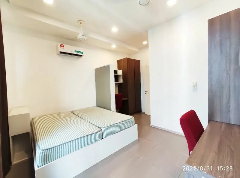 Bedroom features: two single beds with striped bedding, wooden bedside table, study desk with chair, built-in wardrobe, wall-mounted air conditioning unit, recessed ceiling lights, white painted walls, laminate flooring; style: modern.