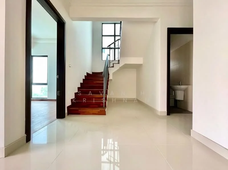 Room features: white painted walls, polished ceramic tile flooring, staircase with wooden steps, large windows allowing natural light, open space layout, high ceiling, doorway leading to another room, small bathroom visible in the background; style: modern; view: garden.