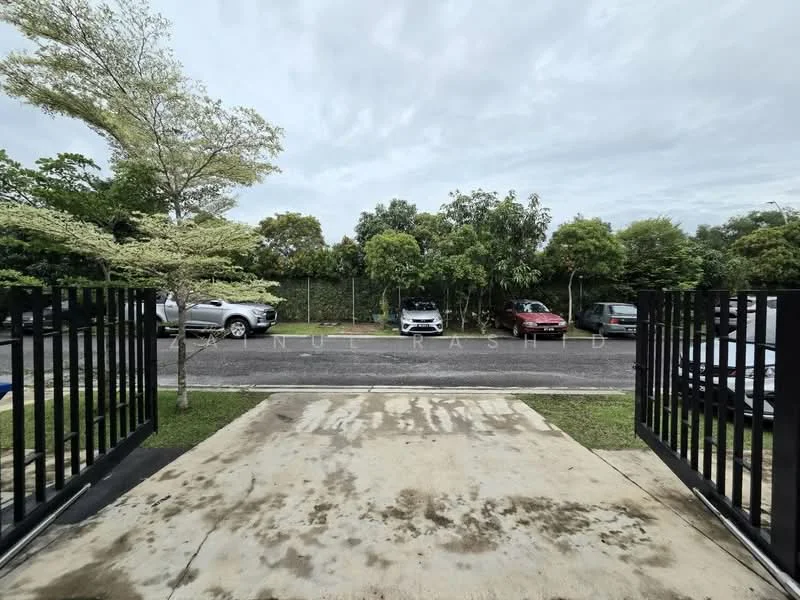 Exterior type: parking deck; features: open-air parking lot, concrete surface, landscaped greenery, trees along the perimeter, visible parked cars, black metal gate, paved driveway; style: modern.