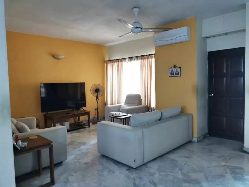 Living features: cream leather sofa, 2-seater fabric sofa in light grey, wooden coffee table, TV console, wall-mounted TV, ceiling fan, air conditioning unit, marble flooring, large windows with sheer curtains, decorative wall art, floor lamp, light yellow painted walls; style: contemporary.