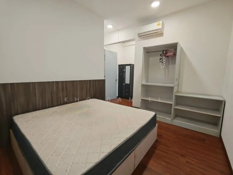 Bedroom features: queen-size bed base without mattress, wooden accent wall, laminate flooring, built-in wardrobe with open shelving, air conditioning unit, light fixtures on ceiling, neutral painted walls, window with no visible treatment; style: modern.