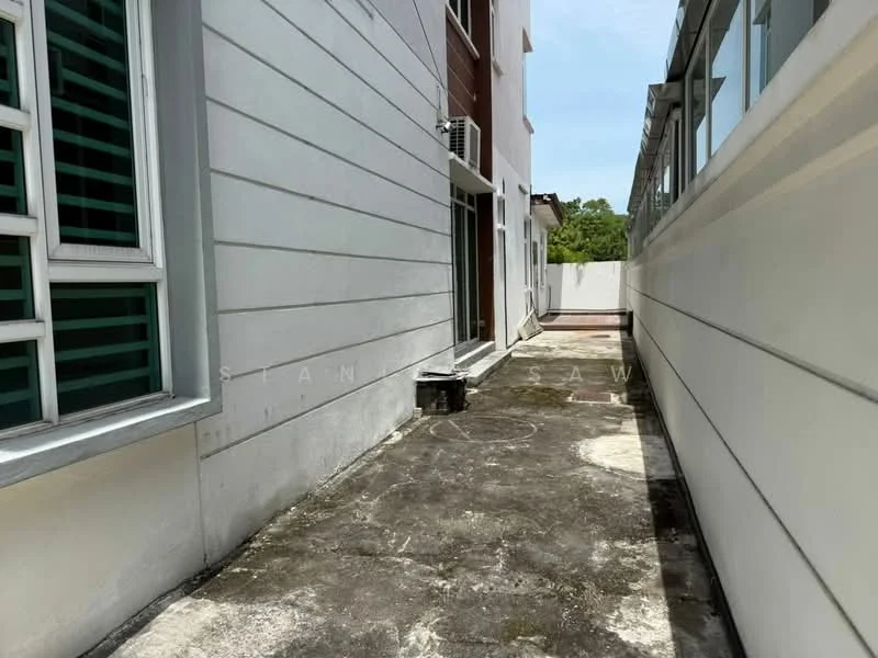 Exterior features: white painted facade, concrete pathway, side access area, windows with green shutters, exterior wall with no visible cladding, surrounding greenery, clear sky, single-storey layout; style: modern.