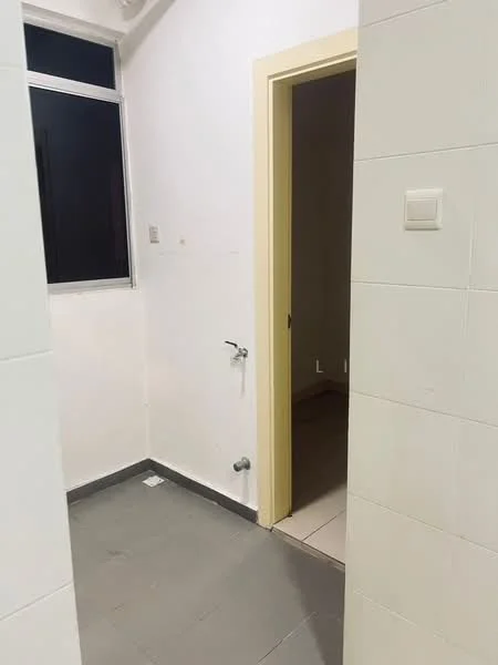 Room features: white painted walls, grey tiled flooring, window with black frame, light yellow door, single wall-mounted faucet, light switch, corner of another room visible.