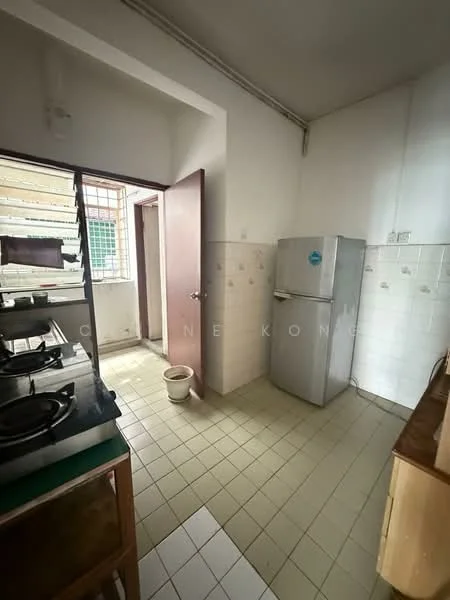 Kitchen features: white tiled walls, light grey tiled flooring, stainless-steel fridge, 4-burner gas hob, kitchen cabinetry, window with metal grille, sink, door leading to another room.