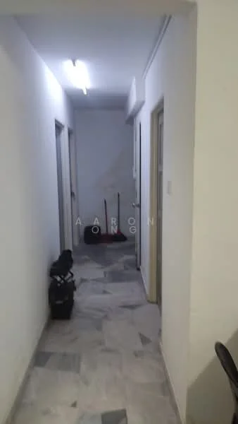 Hallway features: white painted walls, marble tile flooring, fluorescent ceiling lights, two doors leading to rooms, clean and minimalistic design, vacuum cleaner visible, broom and dustpan visible, neutral color scheme; style: modern.