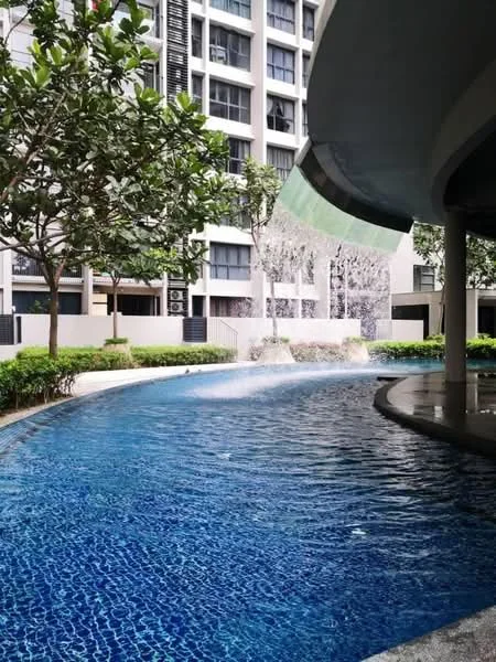 Exterior type: swimming pool deck; features: infinity pool, waterfall feature, landscaped garden with trees, tiled pool deck, surrounding greenery, modern architecture in background, poolside seating area; style: modern.