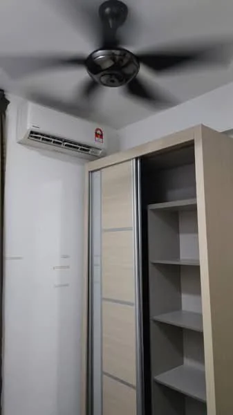 Room features: ceiling fan, wall-mounted split AC, built-in wardrobe with sliding doors, shelves inside wardrobe, white painted walls.