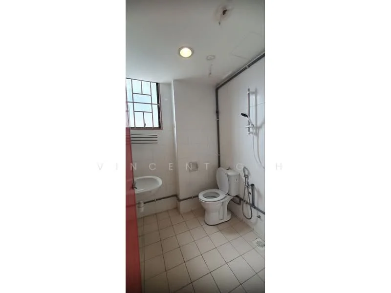 Bathroom features: white tiled walls, cream tiled flooring, one-piece toilet, shower with handheld showerhead, wall-mounted shower faucet, window for natural light, ceiling light, towel rack.