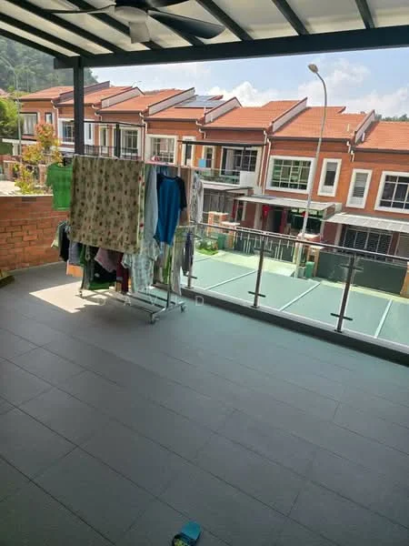 Balcony features: glass railing, tiled flooring, clothes drying rack, laundry hanging, view of neighboring houses, view of tennis courts, overhead roof, outdoor space; view: garden.