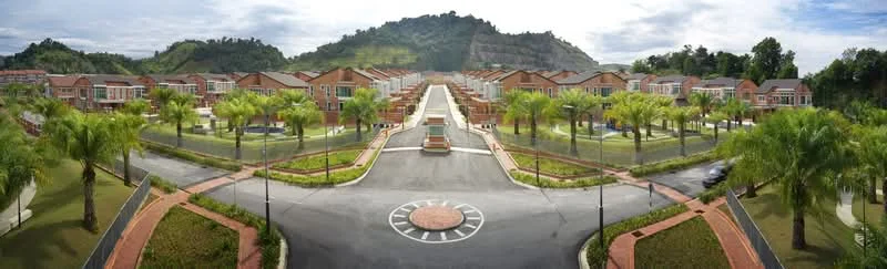 Exterior type: linked terrace house; features: manicured lawn, palm trees, stone-paved walkway, landscaped gardens, circular driveway, multiple linked terrace houses, mountain view in background, wide road access, surrounded by greenery; style: modern.