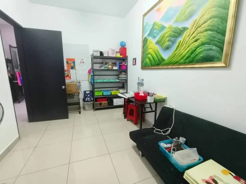 Room features: white painted walls, light grey tiled flooring, black door, framed artwork on wall, shelving unit with colorful storage bins, black sofa, red table, desk lamp, fan, various stationery items on table, decorative globe; style: modern.