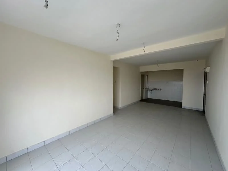 Room features: light-colored painted walls, white ceiling, tile flooring, open layout, kitchen area visible in background, no visible appliances, no visible furniture, unfinished ceiling with exposed wiring.