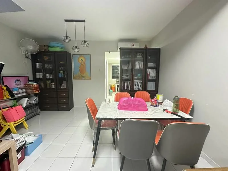 Dining features: white tiled flooring, grey painted walls, dining table with white surface, 6 orange upholstered dining chairs, decorative wall art, black display cabinets, ceiling light fixture with multiple bulbs, wall-mounted fan; style: modern. Room features: storage shelves, various items on shelves, open space leading to another room.