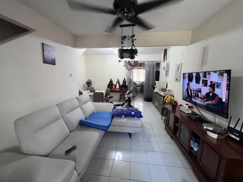 Living features: L-shape sectional sofa in light grey, blue throw pillow, ceiling fan with light, wall-mounted TV, wooden TV console, decorative items on console, white tiled flooring, painted walls in light colour, window with sheer curtains, decorative ceiling light fixture, area rug; style: modern.