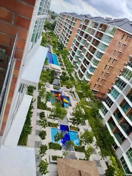 Exterior type: mid-rise condominium; features: brick facade, glass balconies, landscaped garden, infinity pool, children's playground, pool deck with loungers, manicured lawn, tropical landscaping, walking paths, water features; style: modern.