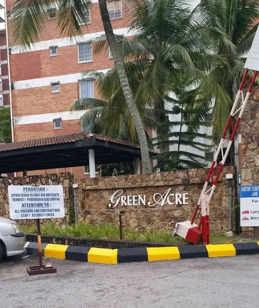 Exterior type: low-rise apartment block; features: stone-clad entrance sign, palm trees, manicured landscaping, yellow and black striped curb, security barrier, brick facade, multiple storeys, surrounding greenery; style: modern.