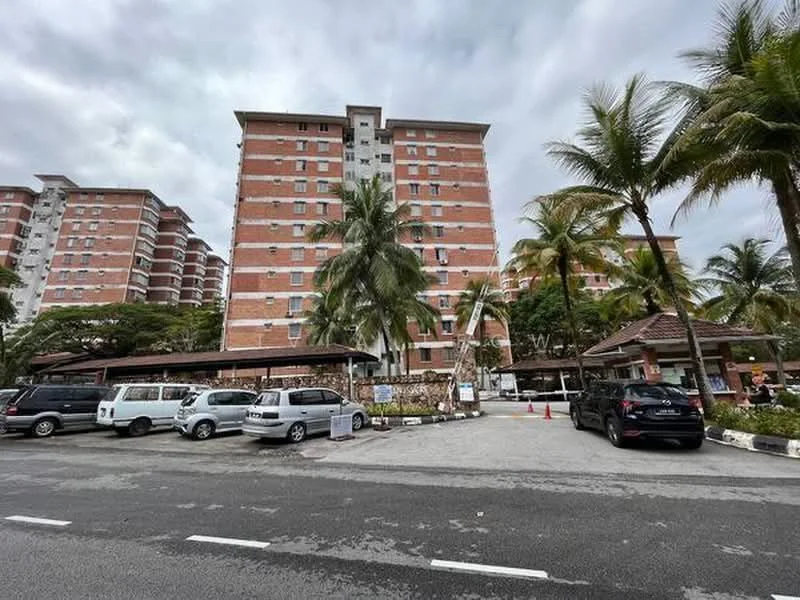 Exterior type: mid-rise condominium; features: red brick facade, multiple storeys, palm trees, manicured landscaping, covered parking area, driveway with interlocking pavers, guard house at entrance; style: modern.