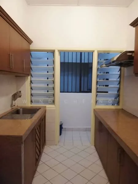 Kitchen features: brown wooden cabinetry, granite countertop, single-bowl stainless-steel sink, chrome pull-down faucet, built-in range hood, tile flooring, sliding louvered windows, open layout to adjacent area.