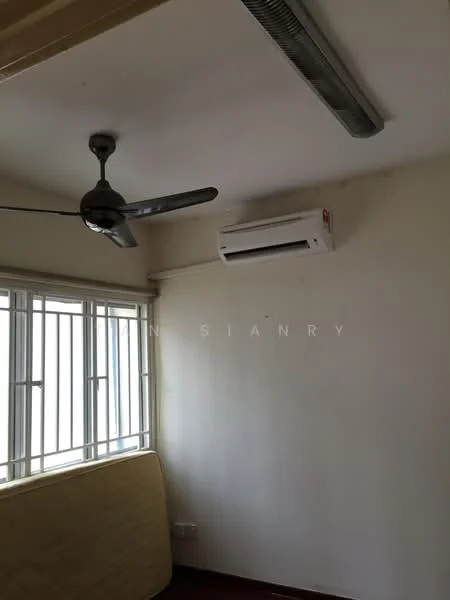 Room features: white painted walls, ceiling fan, 1 wall-mounted split AC, floor-to-ceiling windows with metal grilles, brown mattress on the floor, red carpet flooring.