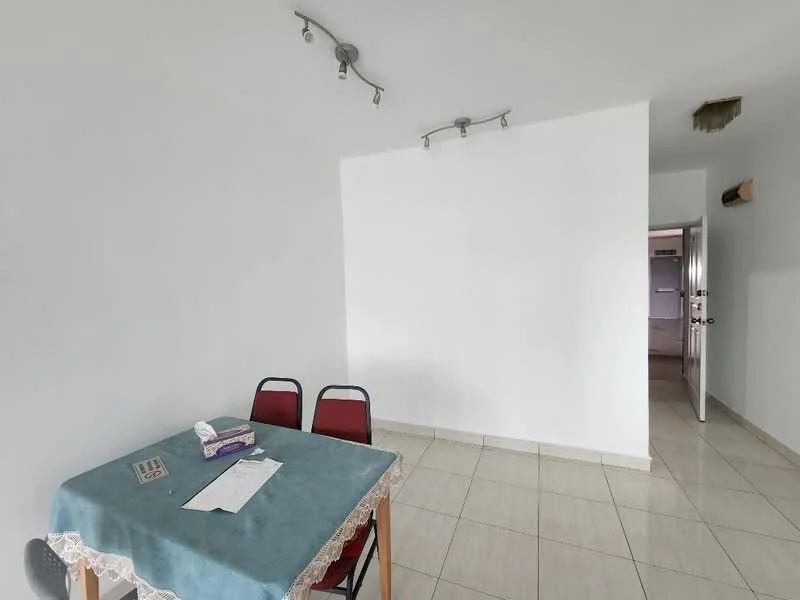 Room features: white painted walls, tile flooring, table with blue tablecloth, two red chairs, recessed ceiling lights, doorway leading to another room; style: minimalist.