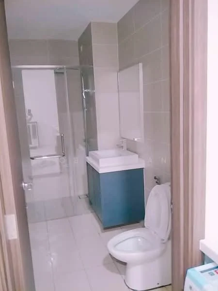 Bathroom features: white ceramic toilet, single-sink vanity with blue cabinet, white countertop, glass shower enclosure, chrome basin mixer faucet, wall-mounted mirror, light beige tiled walls, white tiled flooring; style: modern.
