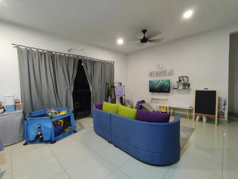 Living features: blue fabric sectional sofa, green and purple accent cushions, coffee table, wall-mounted TV, TV console, area rug, ceiling fan, grey curtains, sliding glass door, decorative wall art, children's play area with toys, chalkboard, light-colored walls, glossy tile flooring; style: modern.
