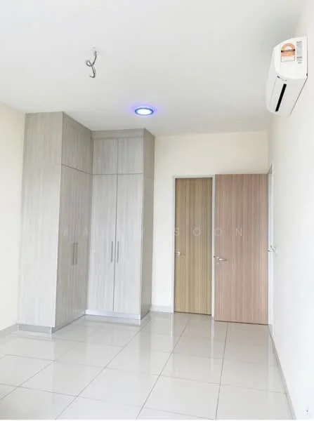 Room features: light-colored walls, glossy tile flooring, built-in wardrobe with light wood finish, two doors (one light wood, one matching the wardrobe), ceiling-mounted light fixture, wall-mounted split AC unit; style: modern.