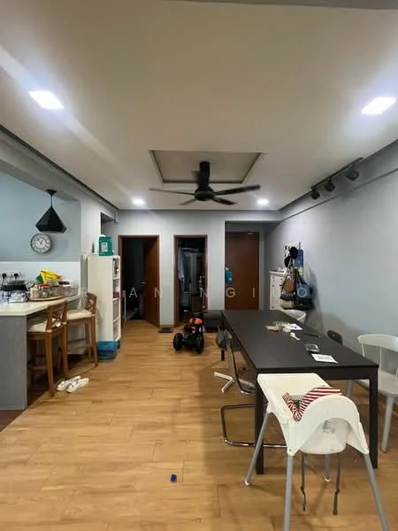 Living features: wooden flooring, recessed ceiling with lighting, 5-blade ceiling fan, dining table with chairs, white cabinetry, kitchen island, open layout, wall-mounted clock, sliding door to hallway, decorative items on table; style: modern. Room features: open shelving, clothes hanging in closet, dark wood doors.