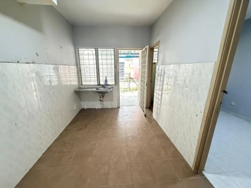 Room features: white tiled walls, light brown tiled flooring, single-bowl sink, window with metal grilles, door leading outside, plain ceiling, no visible appliances, minimal decor; style: minimalist; view: garden.