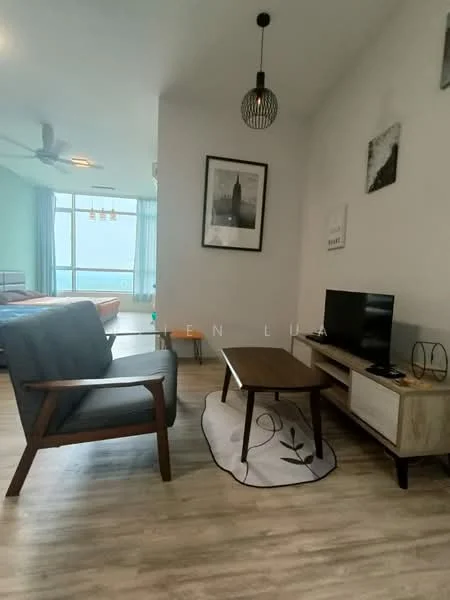 Living features: grey fabric armchair, wooden coffee table, TV console, wall-mounted TV, area rug with floral pattern, 5-blade ceiling fan, large windows with city view, light wood flooring, decorative wall art, pendant light fixture; style: modern; view: city.