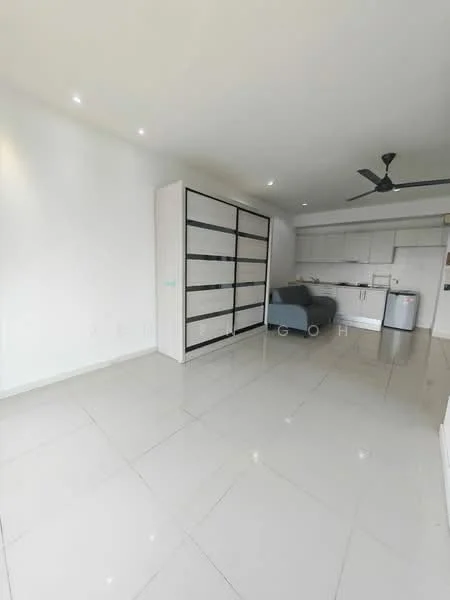 Room features: white painted walls, glossy white tile flooring, recessed downlights, 5-blade ceiling fan, built-in wardrobe with sliding doors, kitchenette with white cabinetry, stainless-steel fridge, grey upholstered chair; style: modern.