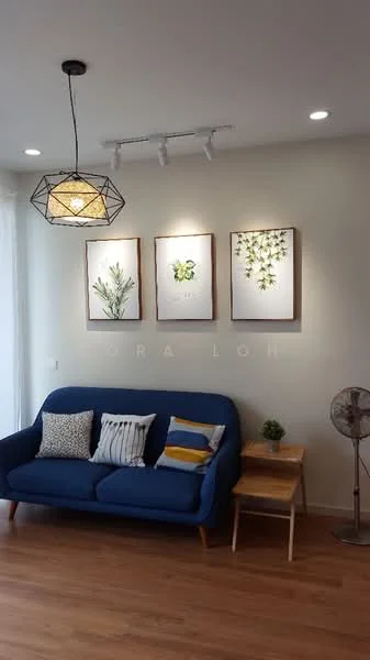 Living features: blue fabric sofa, 3-seater sofa, decorative cushions with various patterns, wooden side table, floor lamp with geometric design, framed artwork on walls, wooden flooring, recessed LED downlights, wall-mounted fan; style: modern.