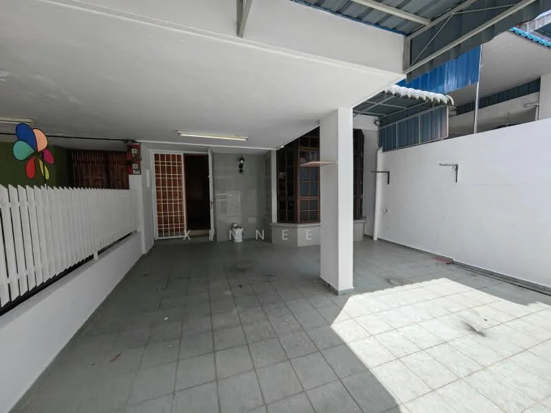 Room features: grey tiled flooring, white painted walls, ceiling with exposed beams, wall-mounted light fixture, open layout, fenced area with white picket fence, outdoor space, sliding door access to another room; style: modern.