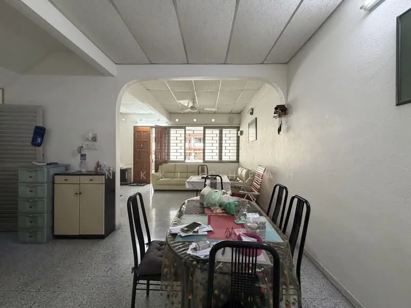 Dining features: round dining table with tablecloth, black dining chairs, light grey walls, textured ceiling, ceiling fan, open layout to living area, decorative wall clock, window with grid pattern, tile flooring. Living features: sofa set, light grey walls, textured ceiling, window with grid pattern, tile flooring.