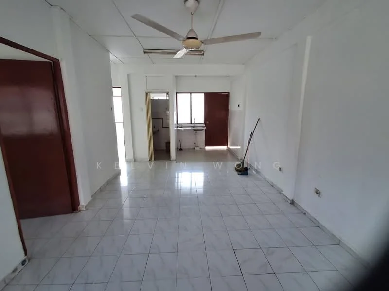Living features: white painted walls, glossy white tile flooring, 5-blade ceiling fan with light, large window with natural light, open layout, doorway leading to kitchen, doorway leading to hallway, clean and minimal decor; style: modern. Kitchen features: white cabinetry, countertop, sink, kitchen appliances visible, open layout to living area; style: modern.