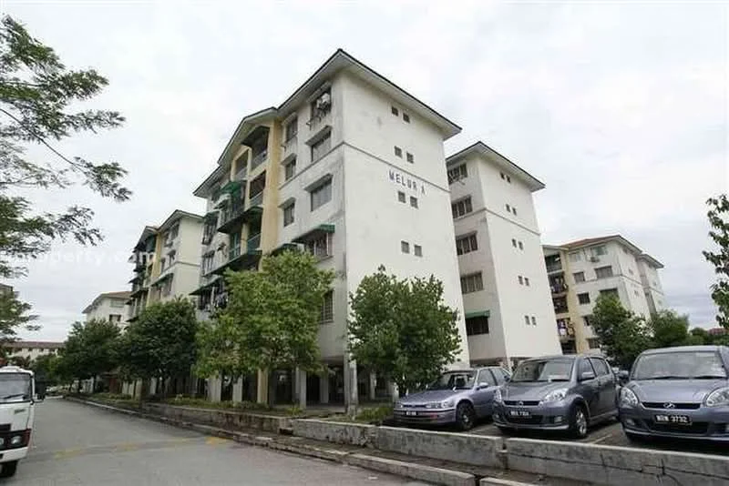 Exterior type: low-rise apartment block; features: white painted facade, green balconies, multiple storeys, surrounded by trees, parking area, concrete pathway; style: modern.