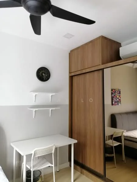 Bedroom features: light wood flooring, white painted walls, grey accent wall, built-in wardrobe with sliding doors, desk with white legs and tabletop, white chair, wall-mounted shelves, ceiling fan, wall clock, decorative artwork in background; style: modern.