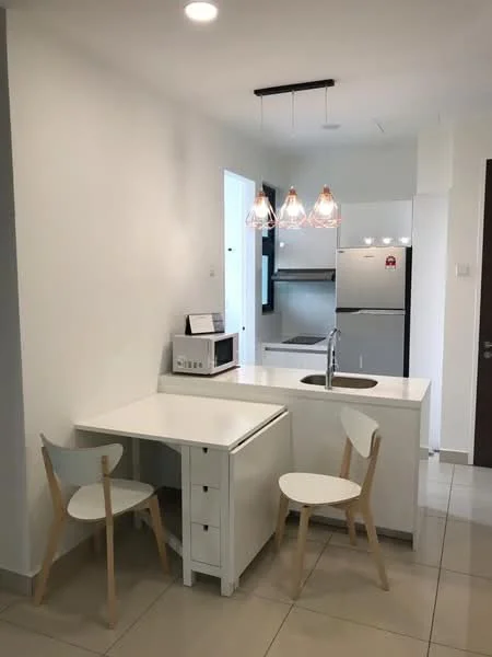 Kitchen features: white painted walls, white cabinetry, marble countertop, stainless-steel sink, chrome pull-down faucet, built-in refrigerator, microwave, pendant lighting, 2 white dining chairs, small dining table, ceramic tile flooring, recessed lighting; style: modern.