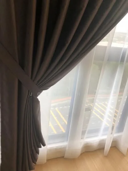 Room features: brown curtains, sheer white curtains, curtain tieback, floor-to-ceiling windows, wooden flooring, view of street; view: city.